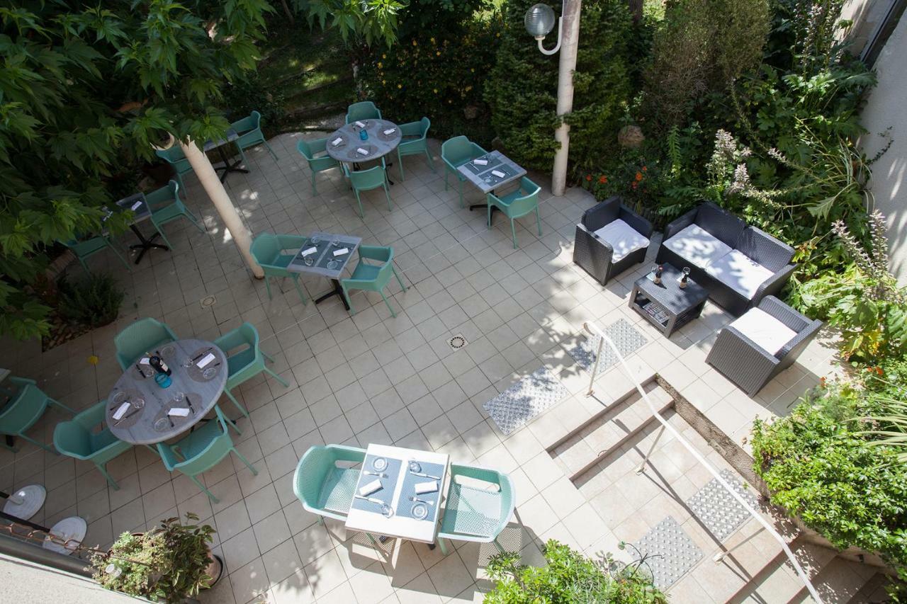 Hotel Le Lion D'Or Manzac-sur-Vern Zewnętrze zdjęcie